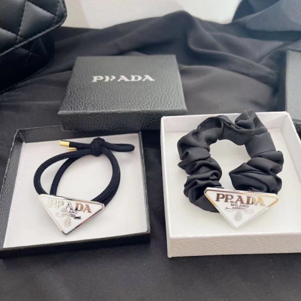 Prada プラダハイブランドヘアアクセサリー髪飾りブランドリボンヘアゴム女性ハイブランドシュシュ存在感抜群ブランドバナナクリップ髪アレンジ