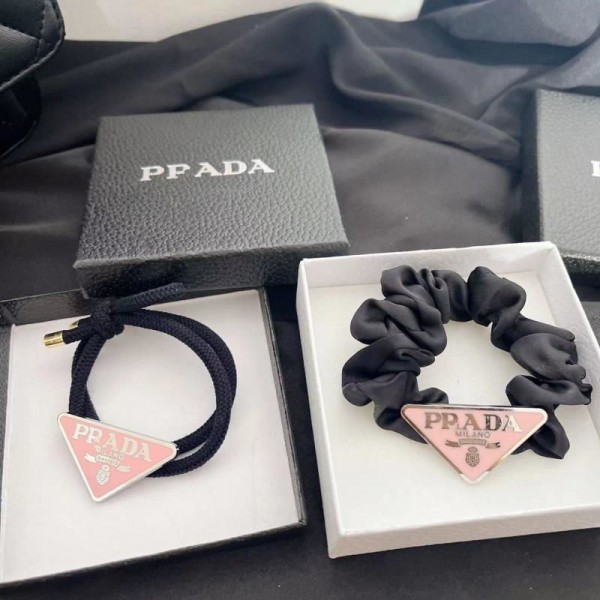 Prada プラダハイブランドヘアアクセサリー髪飾りブランドリボンヘアゴム女性ハイブランドシュシュ存在感抜群ブランドバナナクリップ髪アレンジ