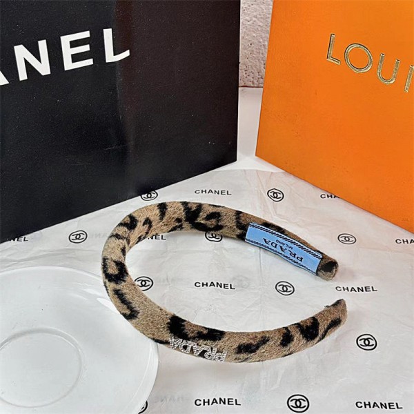 Prada プラダブランドヘアバンドレディースカチューシャ 髪留め ヘアバンド 髪飾り くし型 ヒョウ柄 フェイクファー ふわふわ 前髪 ブラウン