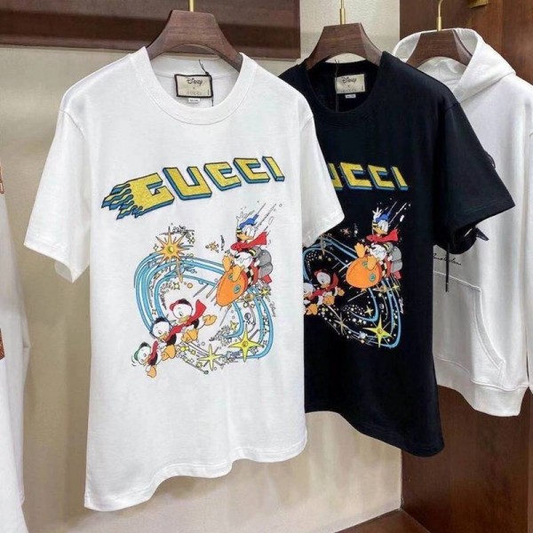 グッチTシャツブランド半袖カジュアル春夏T-shirtコピーGucciドナルドダック絵柄トップス黒 白カップルおすすめ