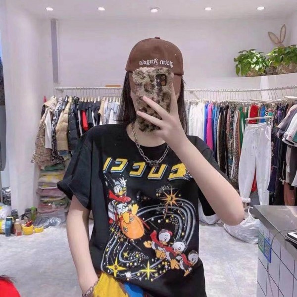 グッチTシャツブランド半袖カジュアル春夏T-shirtコピーGucciドナルドダック絵柄トップス黒 白カップルおすすめ