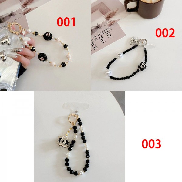 ブランド シャネルスマホストラップ キラキラ Chanel ハンドストラップ オシャレなパールストラップ ファッション スマホアクセサリー 女性用 アウトドア用 パッチ１枚付き