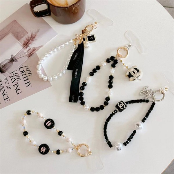 ブランド シャネルスマホストラップ キラキラ Chanel ハンドストラップ オシャレなパールストラップ ファッション スマホアクセサリー 女性用 アウトドア用 パッチ１枚付き