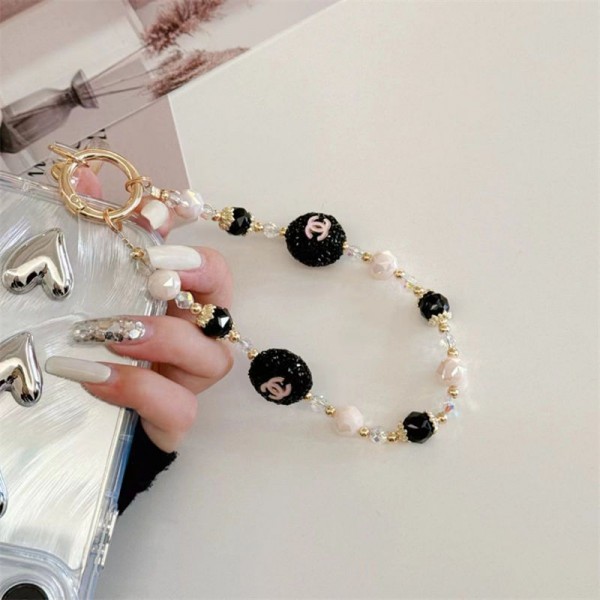 ブランド シャネルスマホストラップ キラキラ Chanel ハンドストラップ オシャレなパールストラップ ファッション スマホアクセサリー 女性用 アウトドア用 パッチ１枚付き