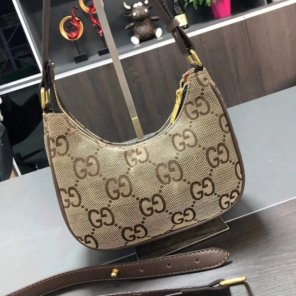 GUCCIハイブランド斜め掛けバッグ 上品 スタイリッシュ グッチ 肩掛けカバン ファスナータイプ 軽量 防水 丈夫 バッグ カバン 女性 大人っぽい 手提げバッグ