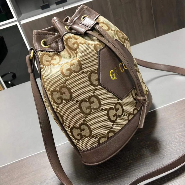 グッチハイブランドバケットバッグレディース向けファッション大容量 防水 耐用 ショルダーバッグ Gucci 筒型 引き紐付きバケットバッグ斜め掛け 肩がけ 通勤 出張