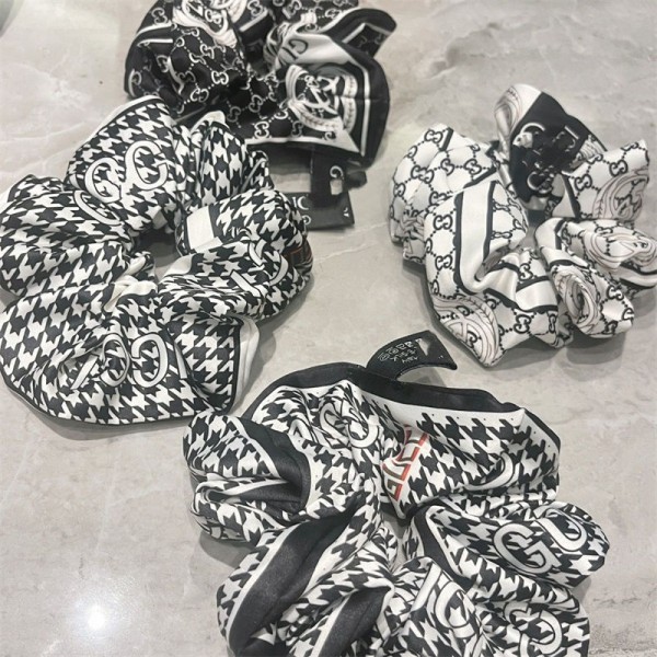 GUCCI グッチ レディース　カチューシャ　花柄 黒　 ロゴ入り　髪飾り GUCCI グッチ レディース カチューシャ 花柄 黒 ロゴ入り 髪飾り